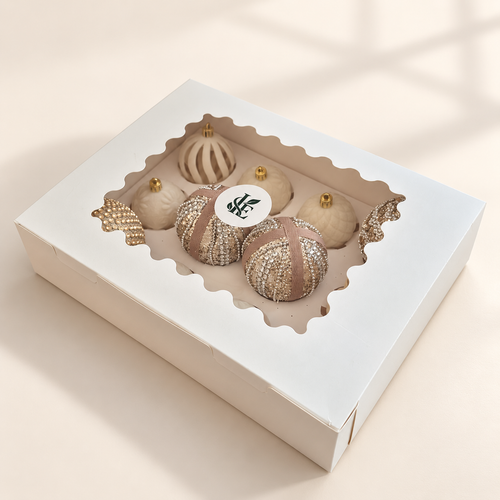 Champagne and Ivory twelve-bauble set in its closed window box