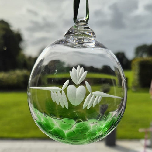Actual claddagh Irish handmade glass bauble photographed in daylight