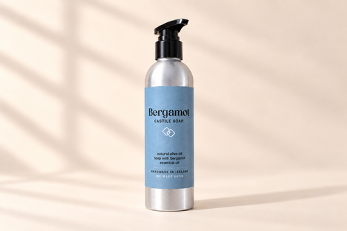 One Bergamot Castile soap pump bottle on an ivory background